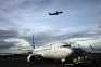 Garuda Indonesia Turun...